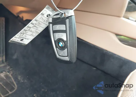 2011 BMW 750I xDrive z USA, uszkodzony, nr VIN WBAKC6C52BC394674